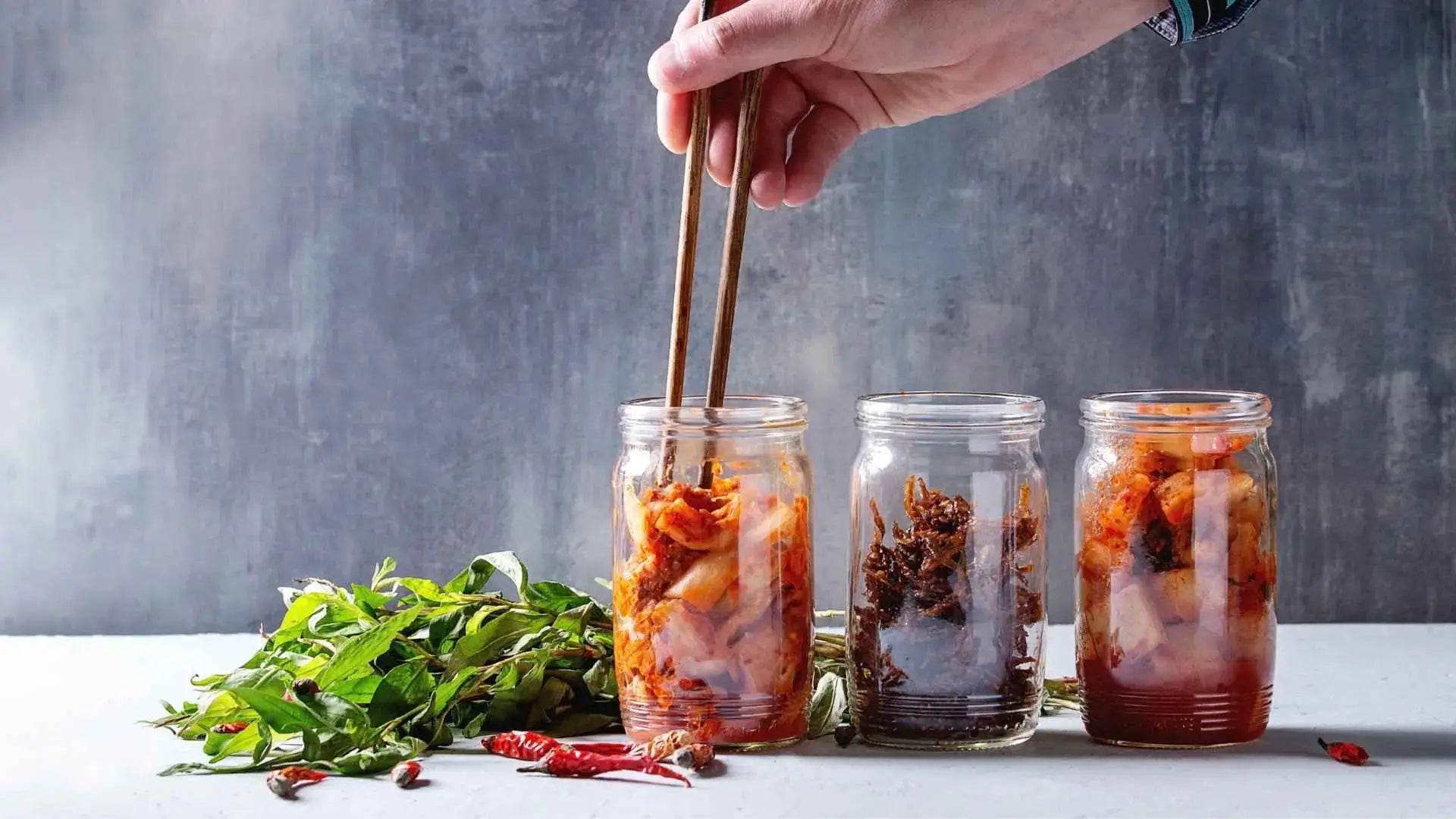 3 jars with kimchi with lactobacillus and bifidobacterium probiotics 